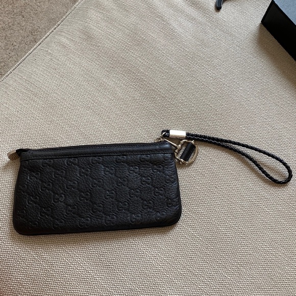 Gucci Handbags - Gucci black clutch with horsebit detail
